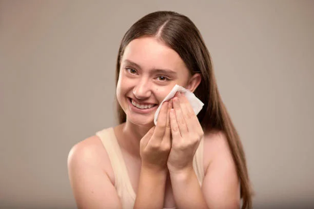 Model with natural glowing skin representing Kendall Jenner Nuxe luxury skincare routine